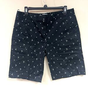 IZOD tee print black golf shorts.  Size 10